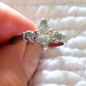 Marquis cut platinum engagement ring.